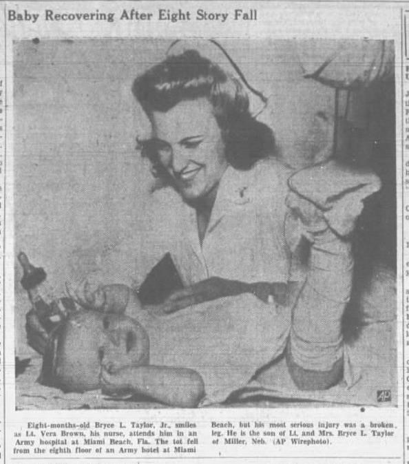 Newspaper photograph of Nurse Brown with the baby